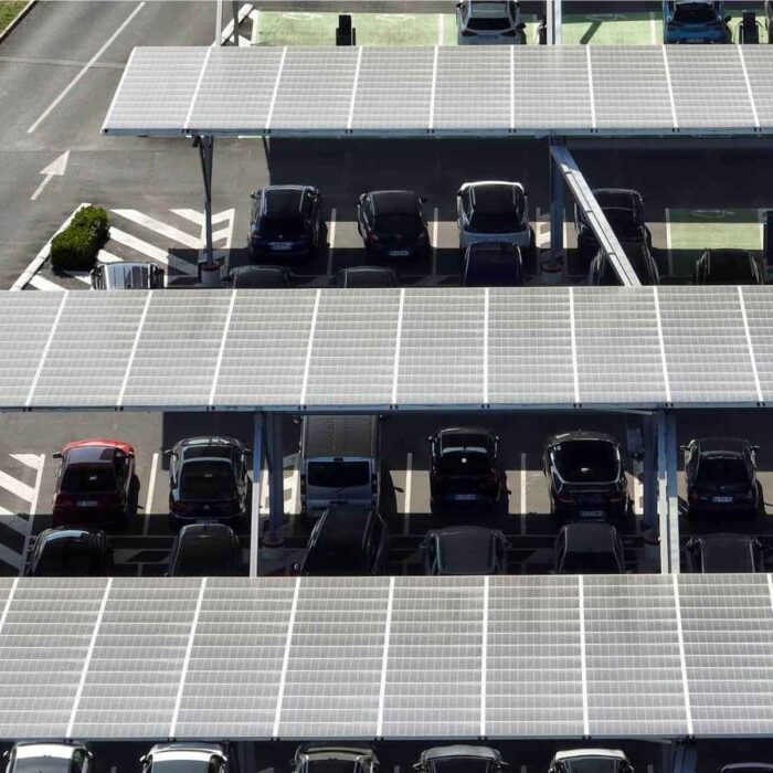 aerial-view-of-solar-panels-installed-over-parking-AFJCLBU.jpg